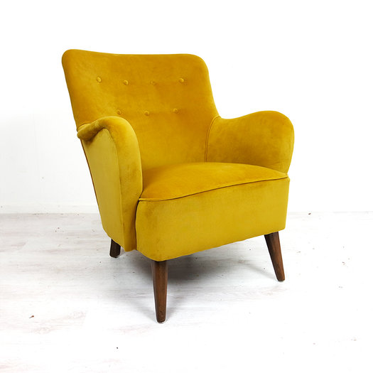 Vintage okergele fauteuil en winkel voor toffe en betaalbare